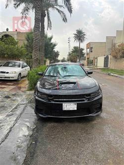 دۆج چارجەر